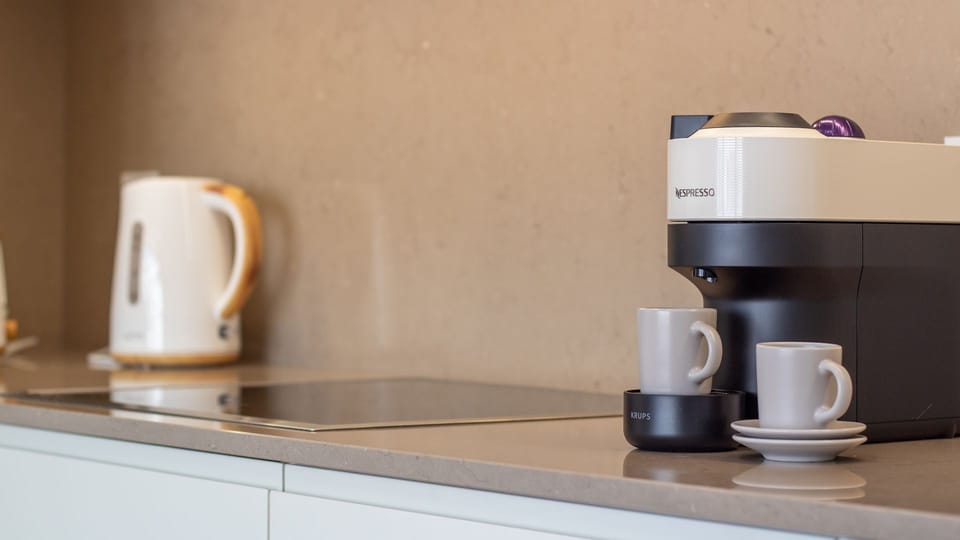 Start your mornings with fresh espresso from your in-room Nespresso machine. #EspressoMoments #MorningCoffee #BaristaAtHome