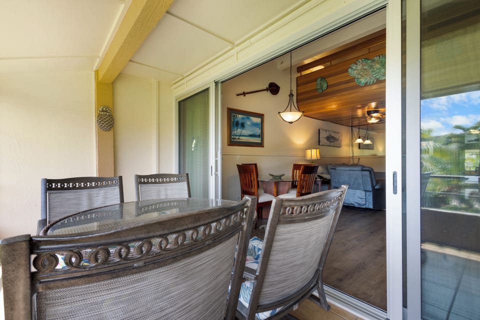 Unwind on your private lanai with extra seating, then step inside to a stylish dining area where island breezes and thoughtful décor invite you to gather and relax.