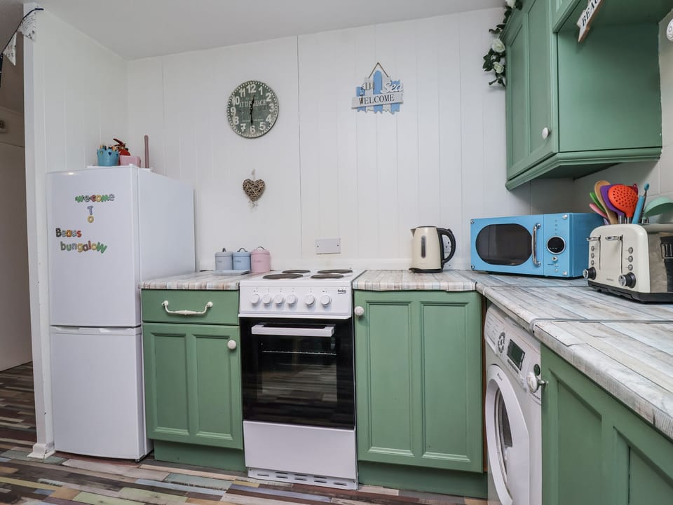 Fridge, microwave, cookware/dishes/utensils