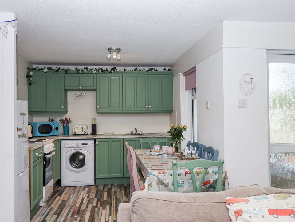 Fridge, microwave, cookware/dishes/utensils
