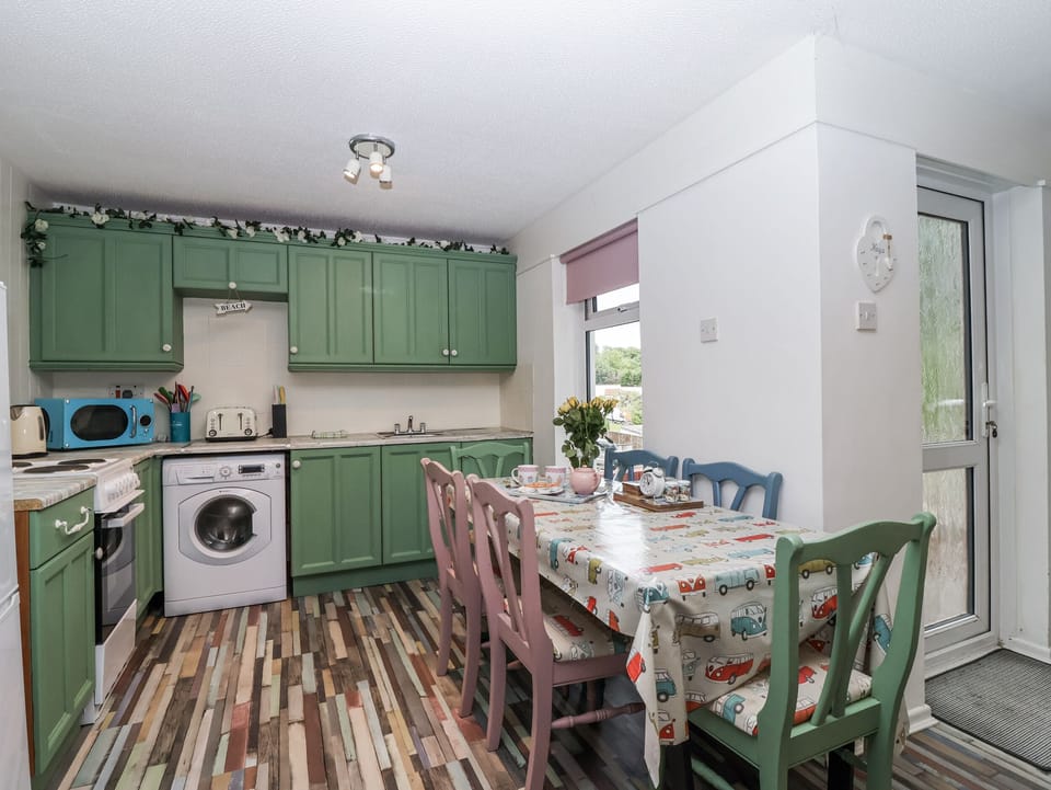Fridge, microwave, cookware/dishes/utensils