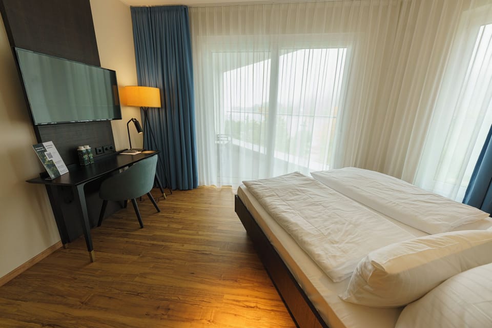 Superior Double Room, Balcony, River View | In-room safe, desk, iron/ironing board, free WiFi