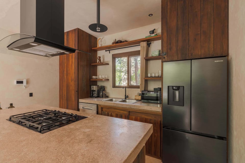 Fully equipped kitchen with everything you need to prepare meals during your stay.