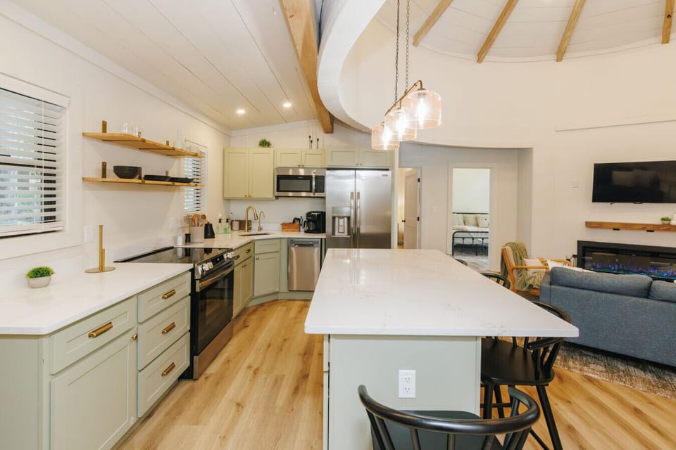 This fully stocked kitchen includes stainless steel appliances, a Keurig coffee machine, and all the cookware, utensils, and dishes you’ll need.