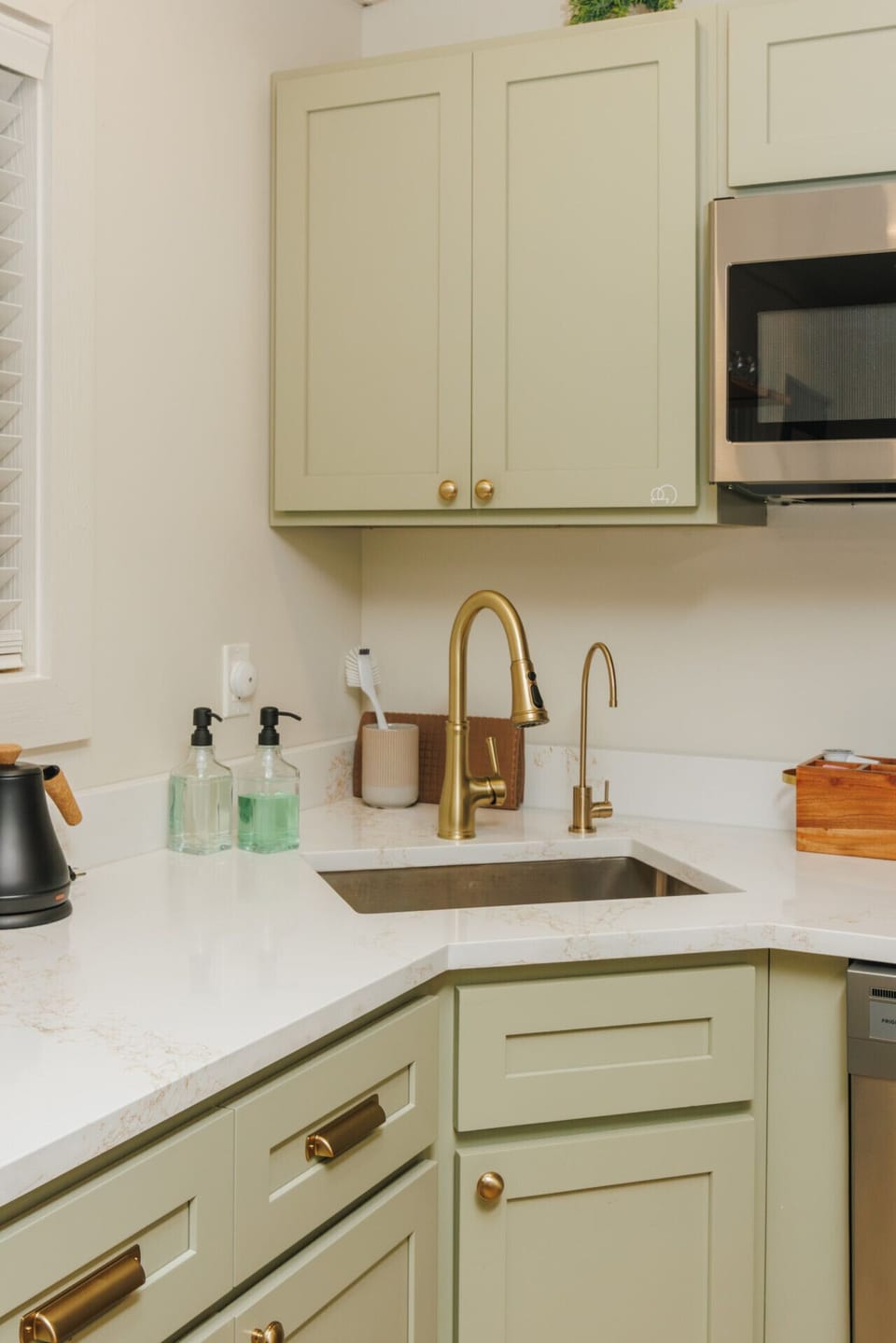 Natural light from the window keeps the kitchen feeling open and airy, whether you’re cooking a full meal or enjoying a quick snack.