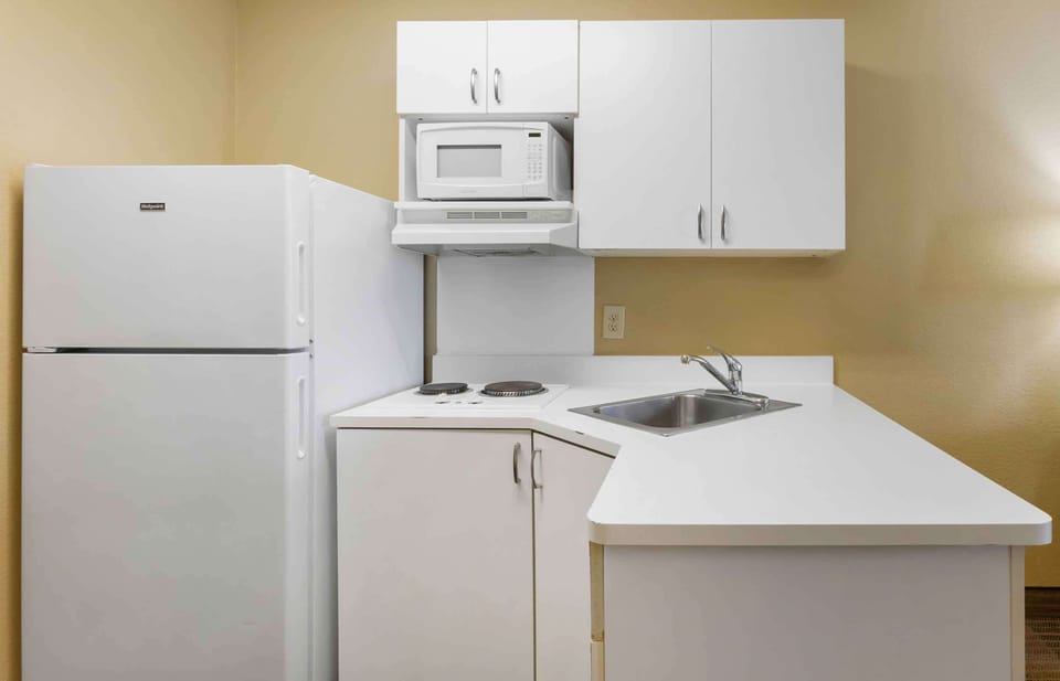 Studio, 1 King Bed, Non Smoking | Private kitchen | Fridge, microwave, stovetop, coffee/tea maker