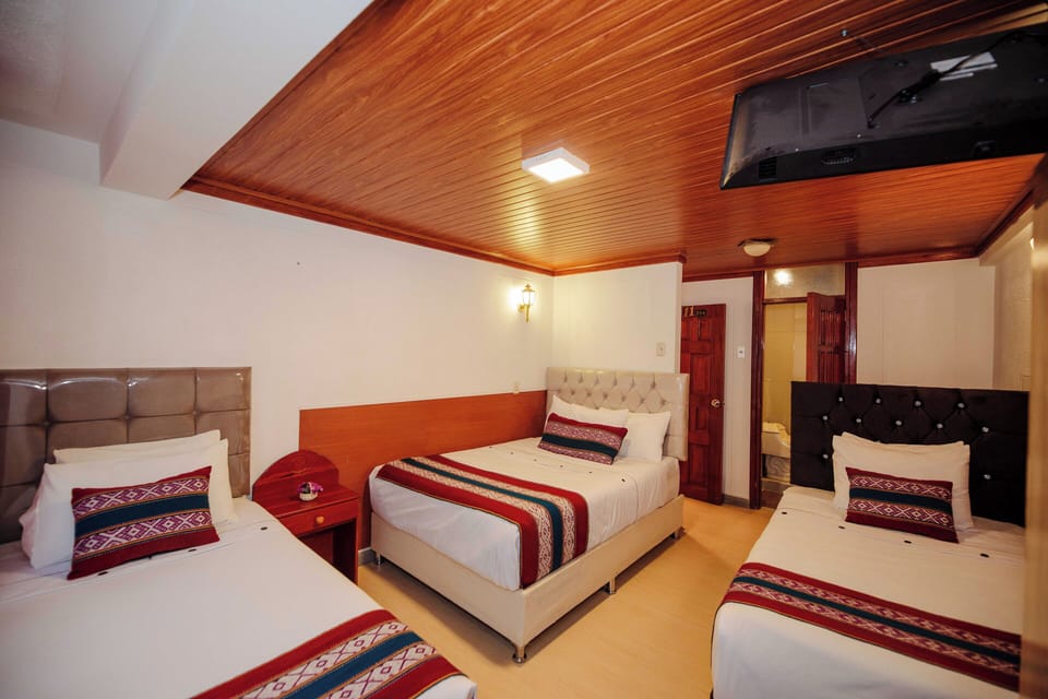 Traditional Triple Room | In-room safe, iron/ironing board (on request), WiFi (free), bed sheets