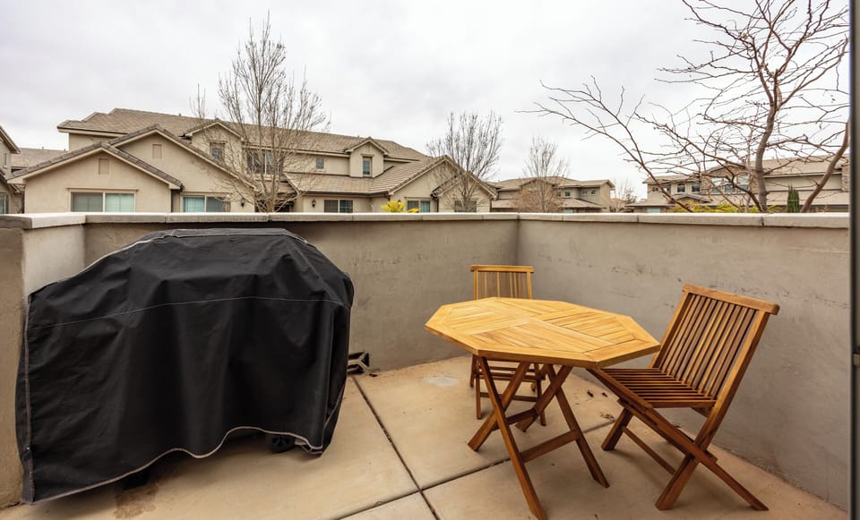 Private patio with full grill & seating for four