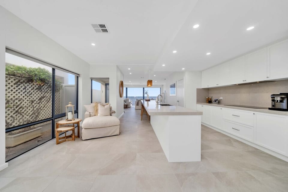 Spacious open plan kitchen with garden outlook