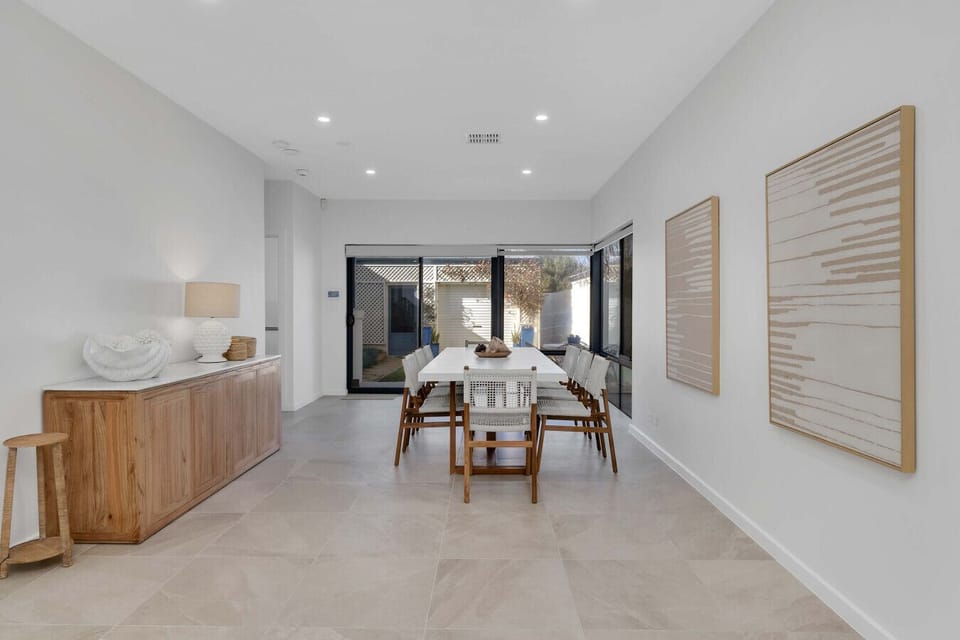 Light-filled open plan living and dining area with direct garden access