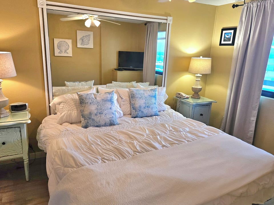 Master bedroom king bed.