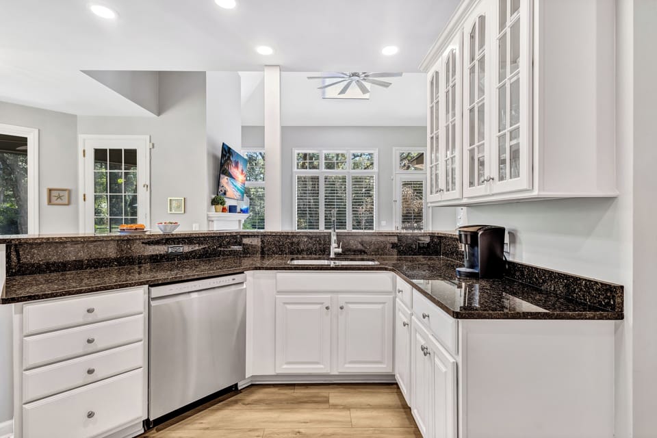 Enjoy preparing delicious meals with our stainless steel appliances, including a dishwasher, microwave, toaster, and Keurig coffee maker