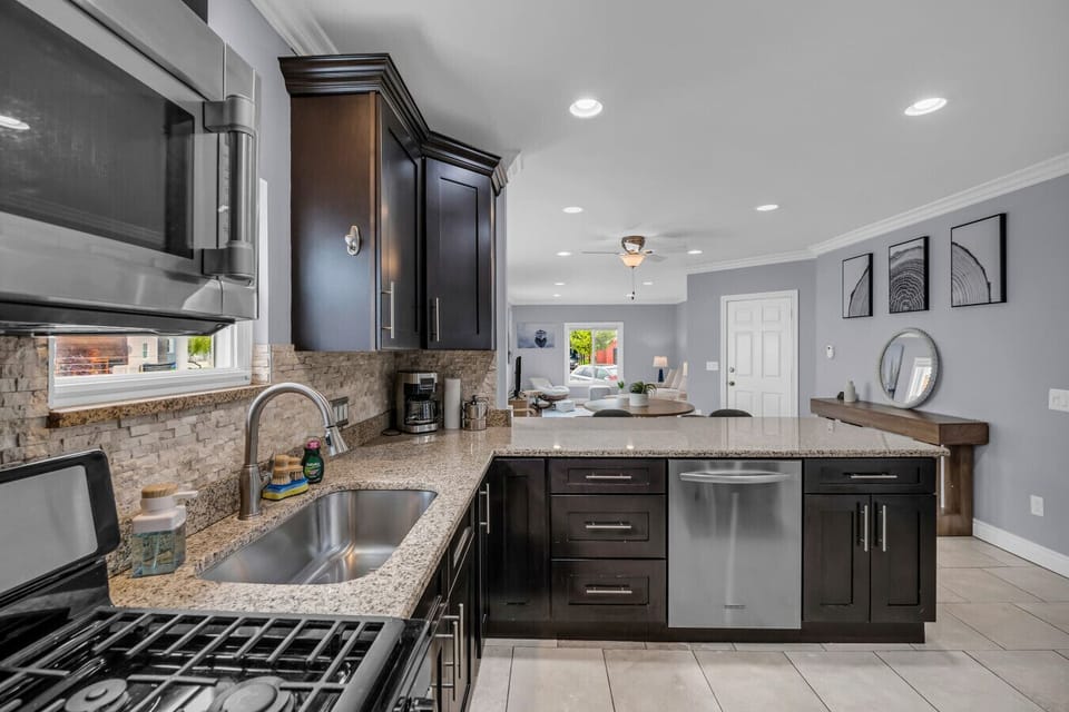Work triangle? Activated. Snacks? Accessible. Wine glasses? Probably already chilling.