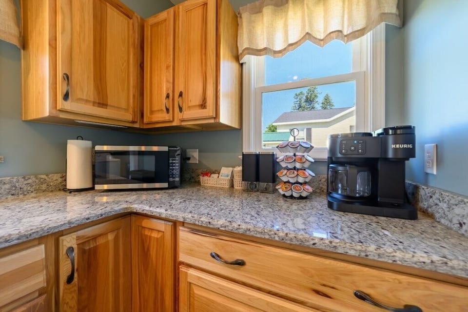 Fully stocked kitchen with Keurig duo.