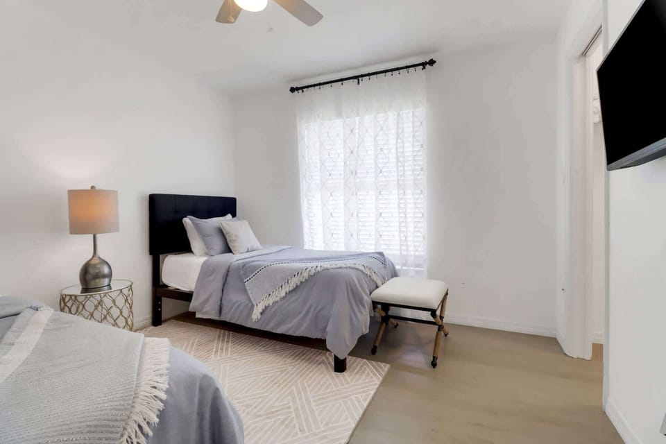 Complete with a Smart TV, this bedroom blends comfort and entertainment for the ultimate sleepover vibe.
