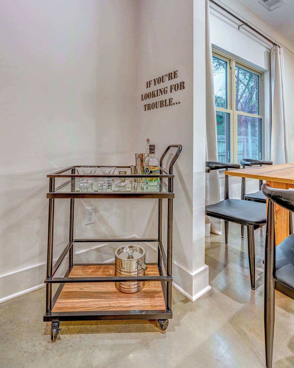 Our chic bar cart is fully stocked with glassware and ready for your favorite drinks—perfect for cocktail hour or a cozy night in.

