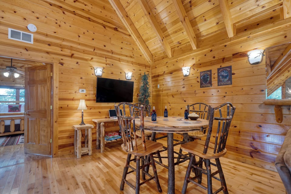 Cozy loft with a TV and a selection of board games—perfect for laid-back entertainment.