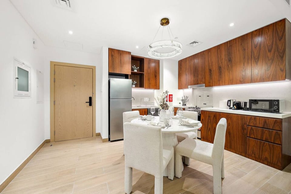 Dining Area: Enjoy gourmet meals in this stylish, modern space with elegant lighting and décor!