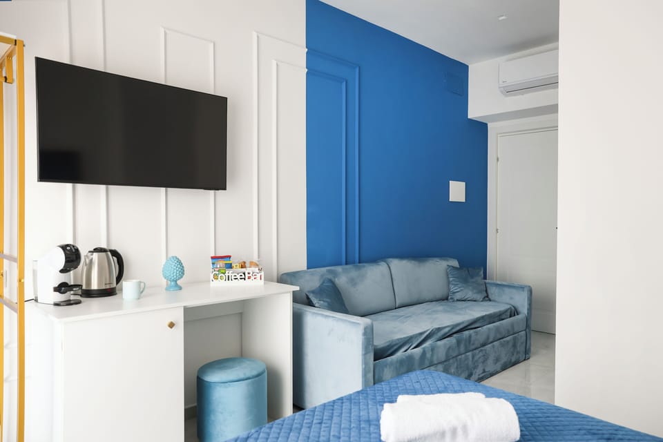 Room with blue bed | Blackout drapes, soundproofing, WiFi (free)