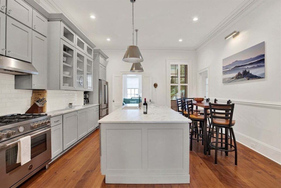 Gourmet kitchen with high-end appliances + custom cabinetry.