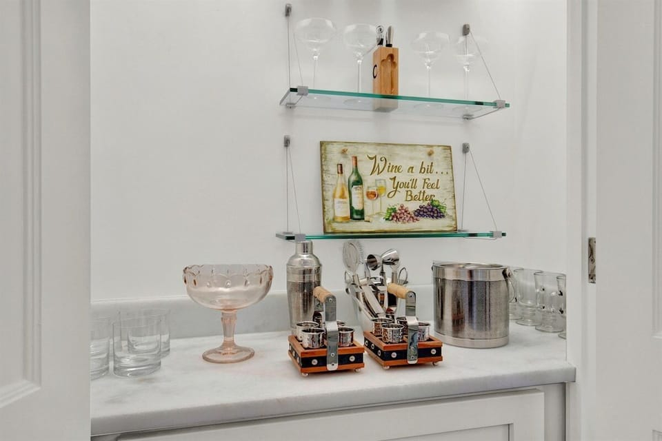 Sunroom bar station ready for cocktails and relaxed afternoons.