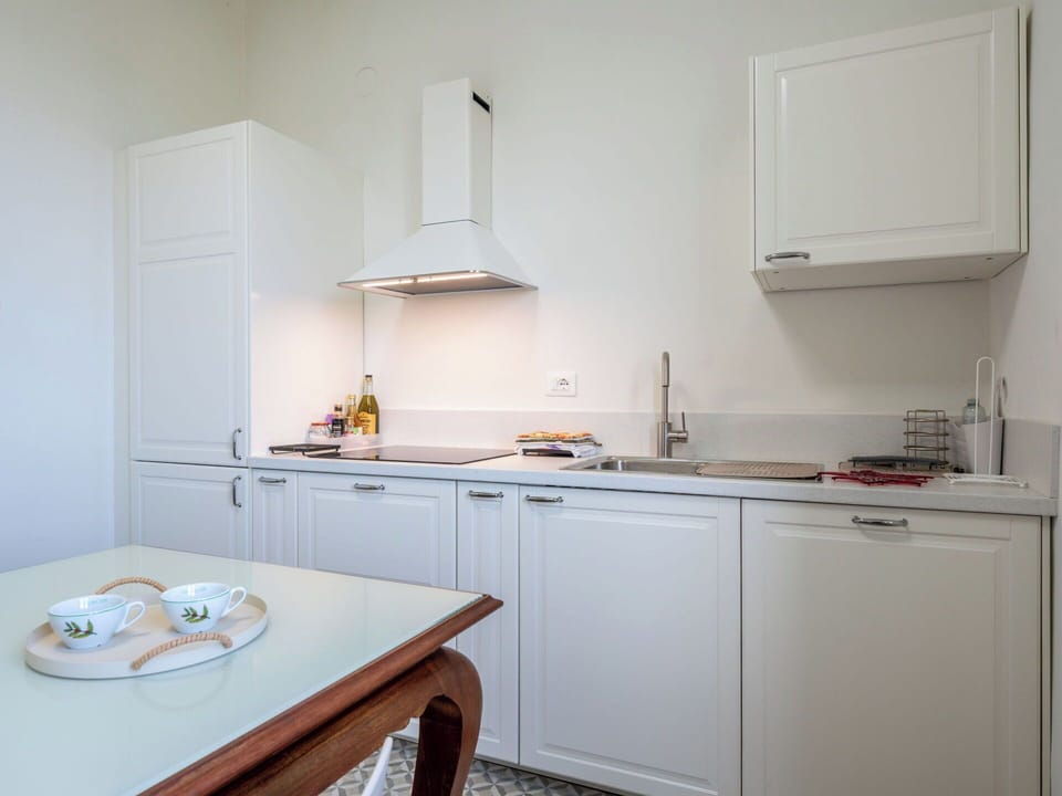 Kitchen, Interior Design, Countertop, Kitchen Appliance, Cabinetry, Major Appliance, Flooring, Tap, Room, Home
