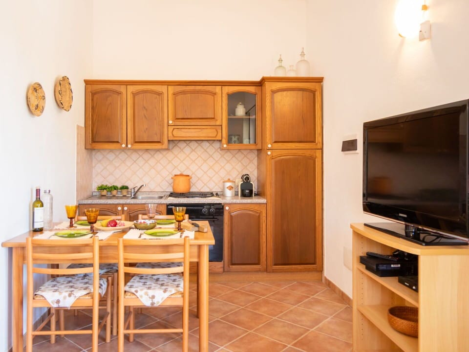 Interior Design, Wood, Furniture, Kitchen, Flooring, Countertop, Floor, Kitchen Appliance, Room, Major Appliance