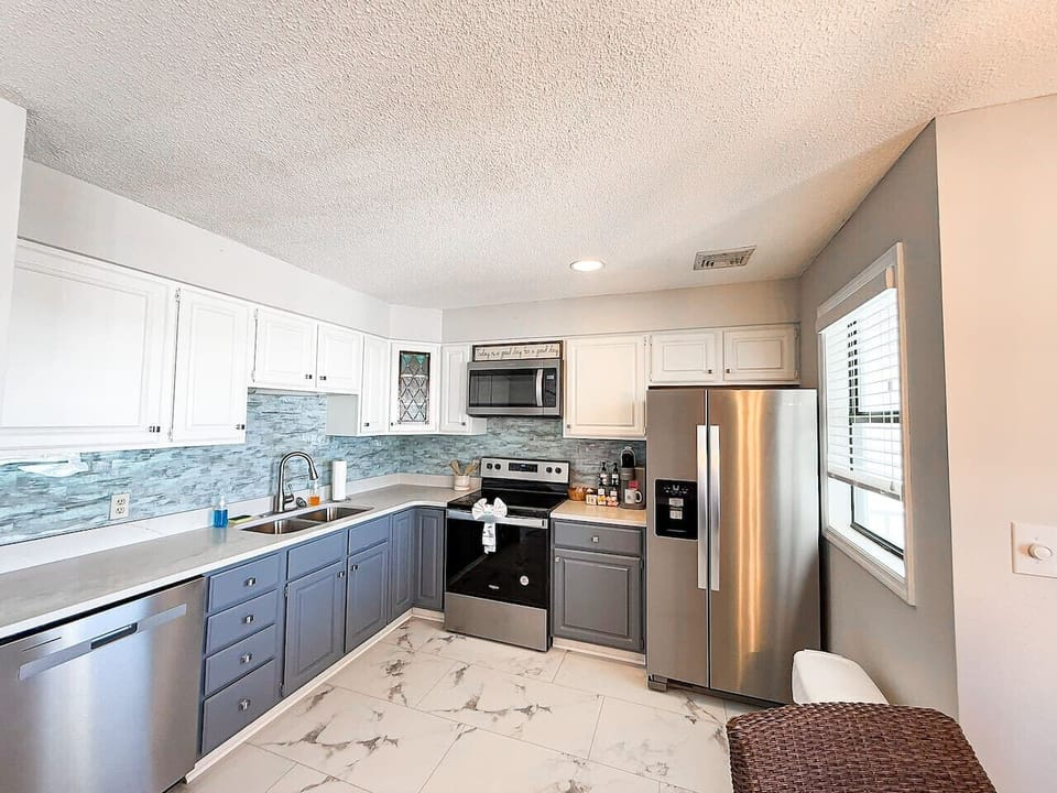 Fully equipped kitchen with stainless steel appliances
