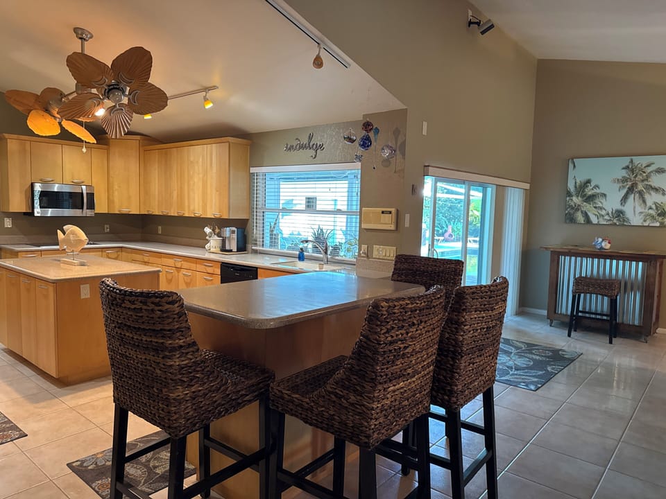 Kitchen looks out at the pool