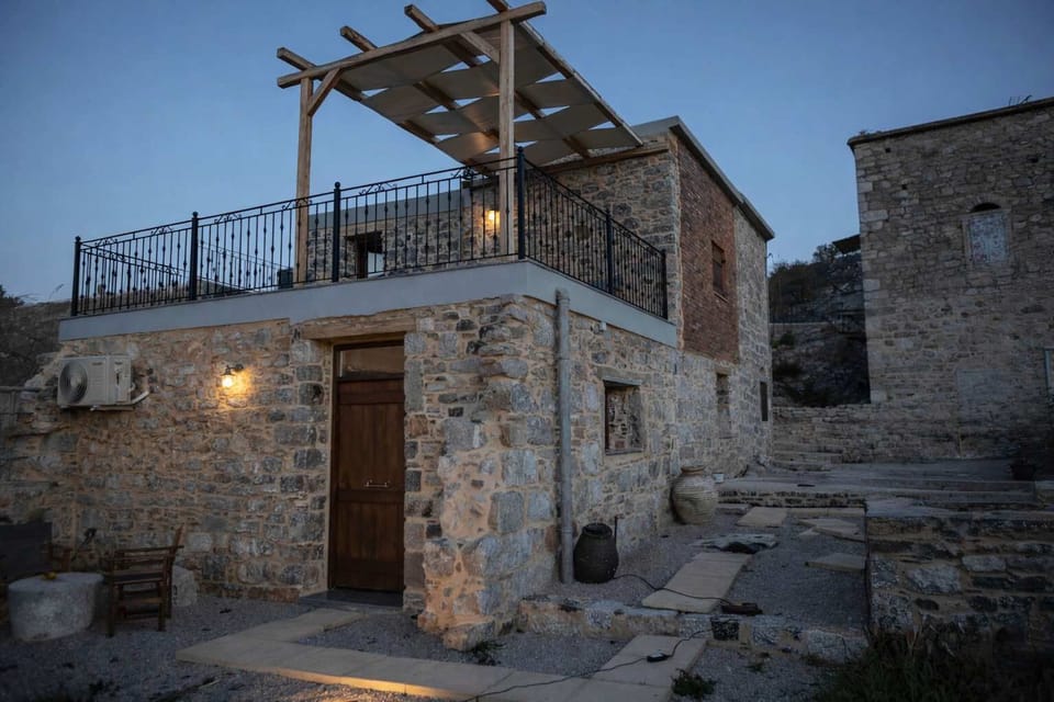 Traditional Stone House Exterior with Courtyard and Entrance