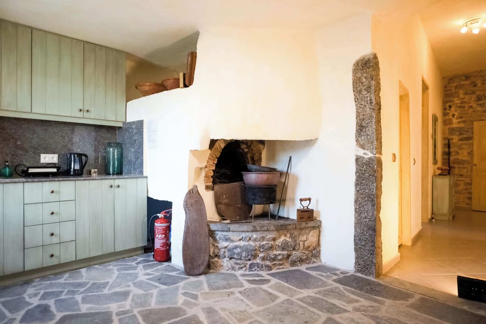 Kitchen and Living Area with Traditional Stone Interior