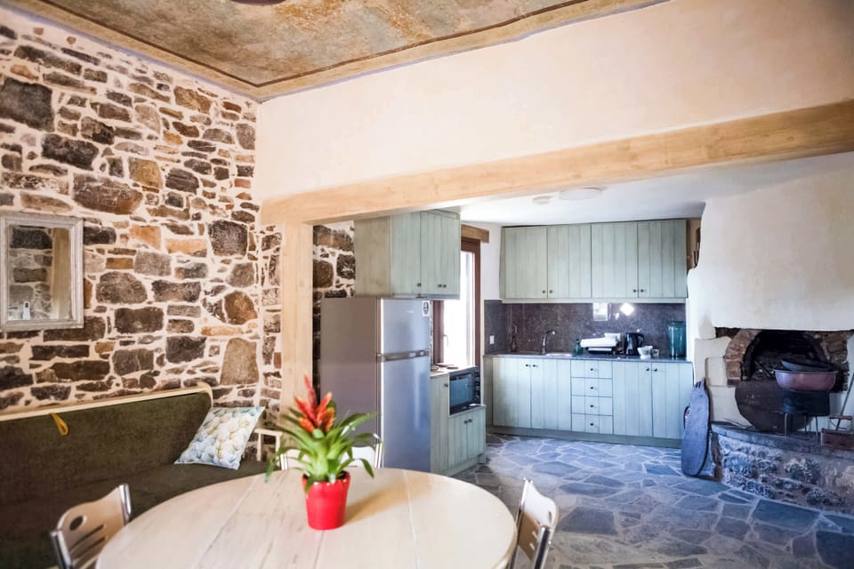 Living Area with Stone Architecture and Open-Plan Layout