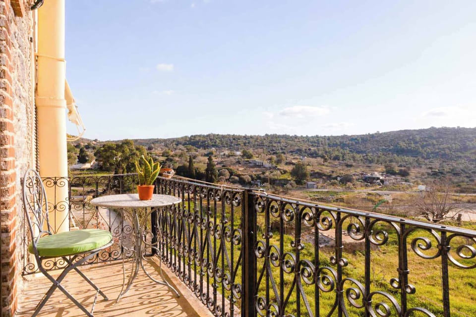 Private Balcony with Open Views over the Traditional Village and Surrounding Hills