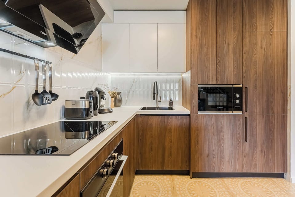 Modern Kitchen with Built-In Appliances — Fully Equipped with Quality Cookware, Sleek Storage & Smart Layout for Easy Meals