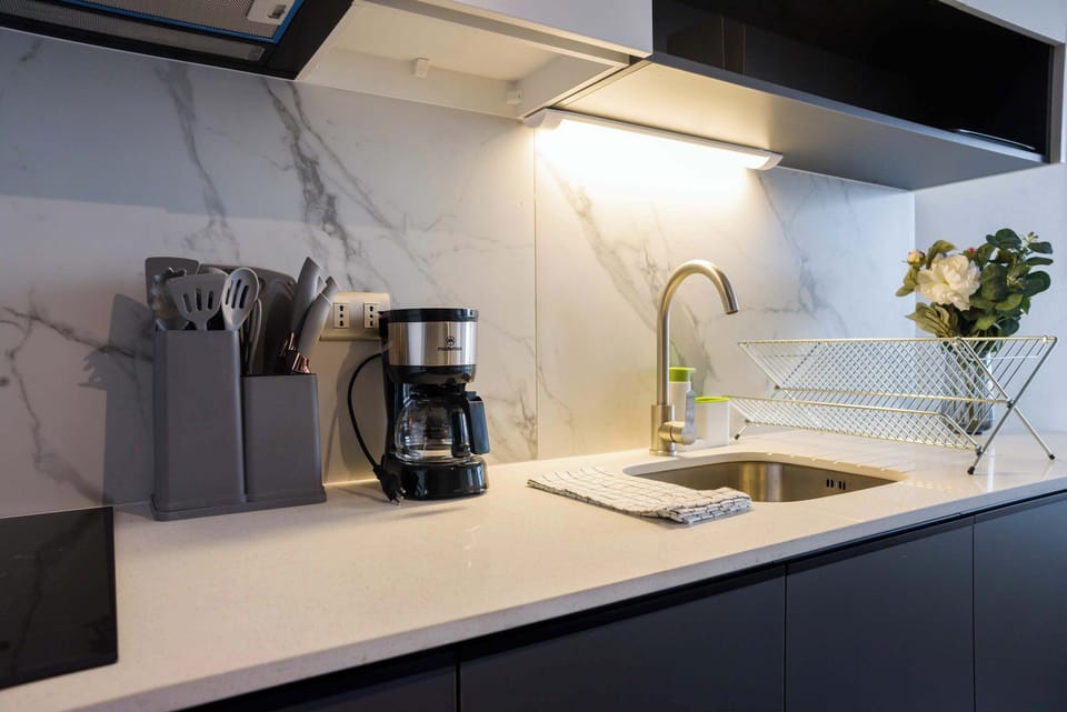 Modern kitchen with sleek countertops and all essentials for a comfortable stay in the heart of Chile.