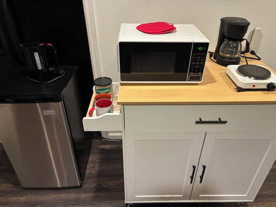 Complete Kitchen with dishes and utensils to cook