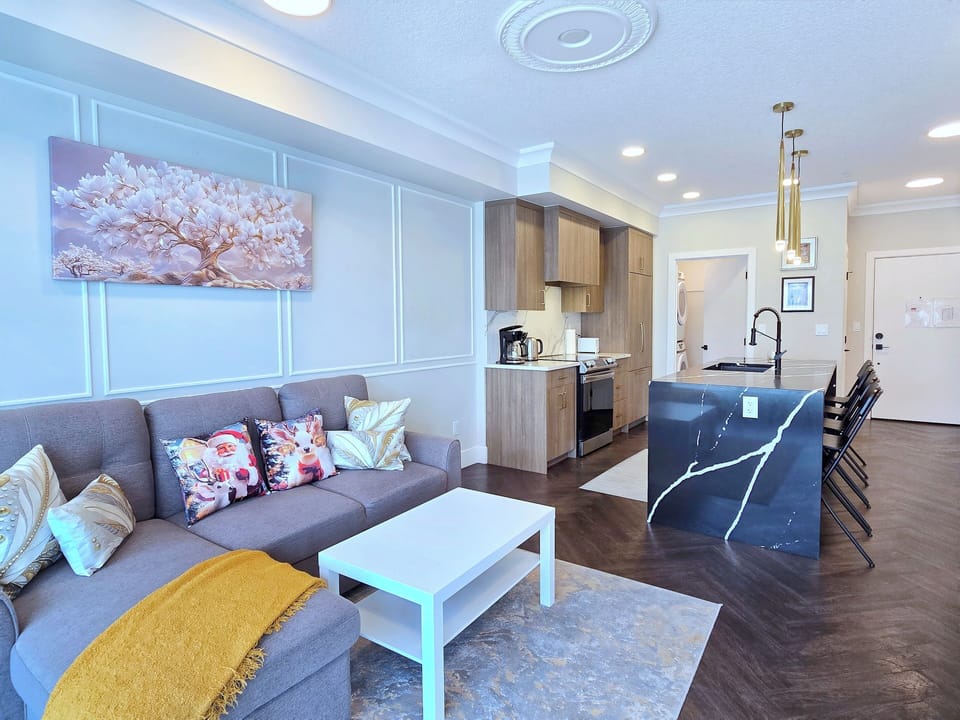 Stylish Calgary downtown condo living room with sofa and smart TV
