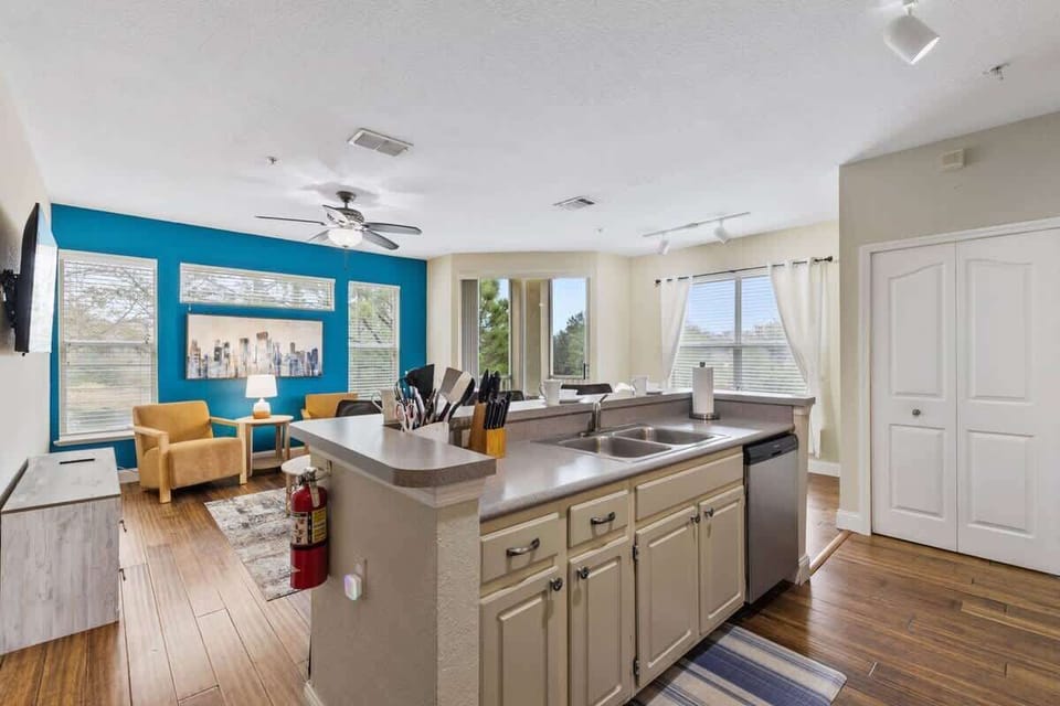 - Open concept kitchen, fully equipped with modern appliances & essentials
- Spacious island with barstool seating makes dining, entertaining, & meal prep effortless
- Enjoy a seamless flow from the kitchen to the living space, with bright windows