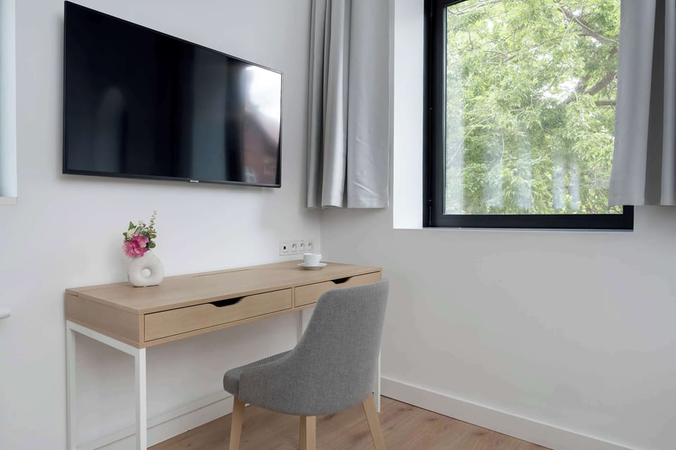 The living room offers a perfect blend of comfort and modern style.