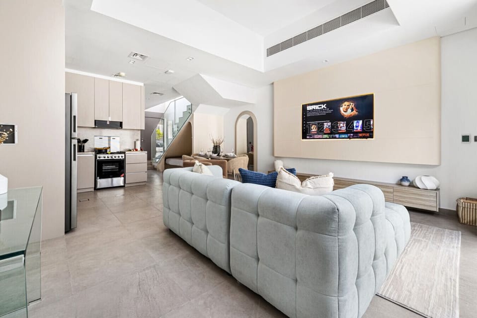 Bright living and dining area with a cozy setup.