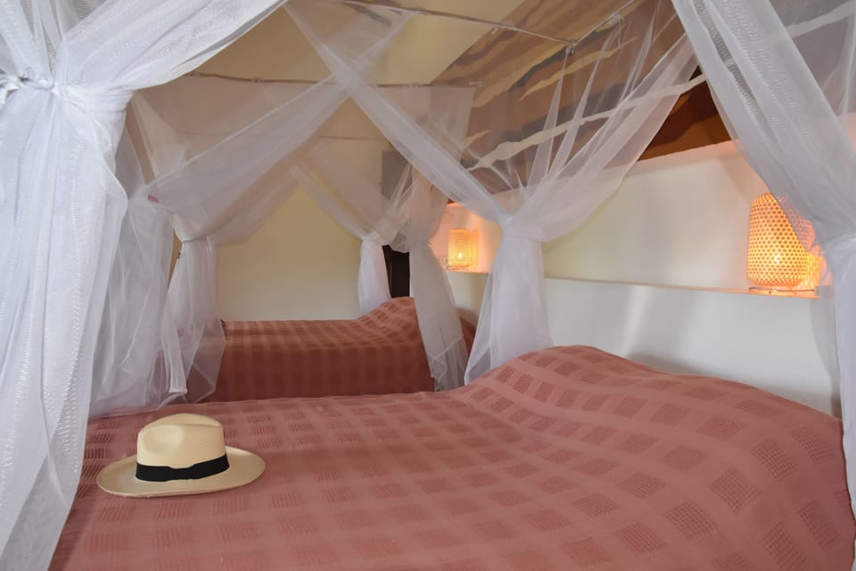 Deluxe Quadruple Room, 2 Queen Beds | Individually decorated, individually furnished, desk, laptop workspace