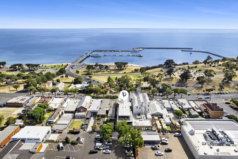 Aerial view highlighting proximity to the waterfront and local attractions