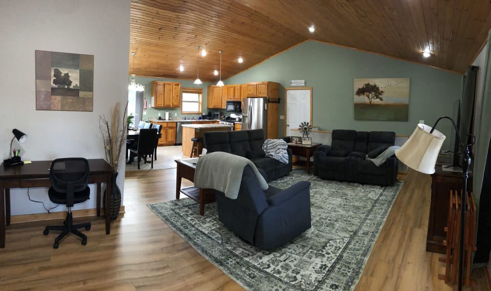 Open concept w/ desk, power reclining couch & loveseat & reclining swivel chair