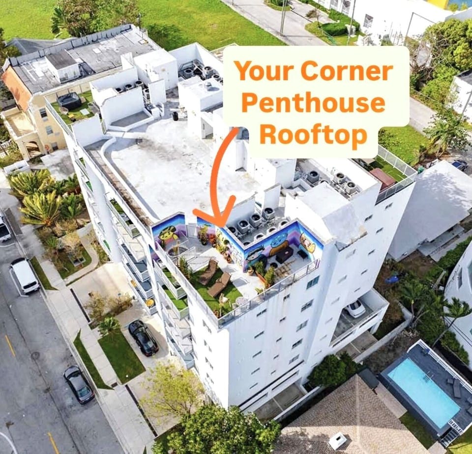 Corner private rooftop. 
Note: rooftop under renovation. no longer w/graffiti 