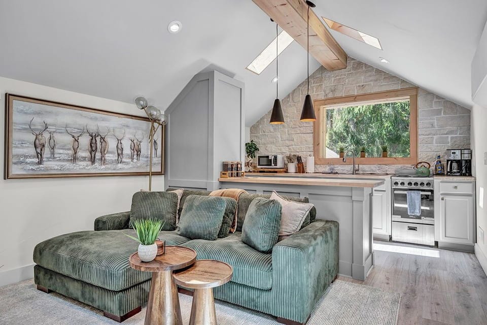 Cozy Living Room with 55-inch Smart TV, Fireplace, and bistro table.