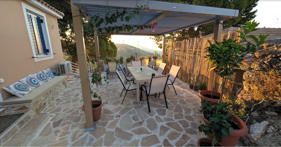 patio with alfresco dining and pergola with adjustable shade 