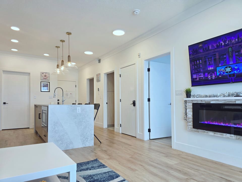Bright hallway, open layout, modern design, downtown Calgary condo