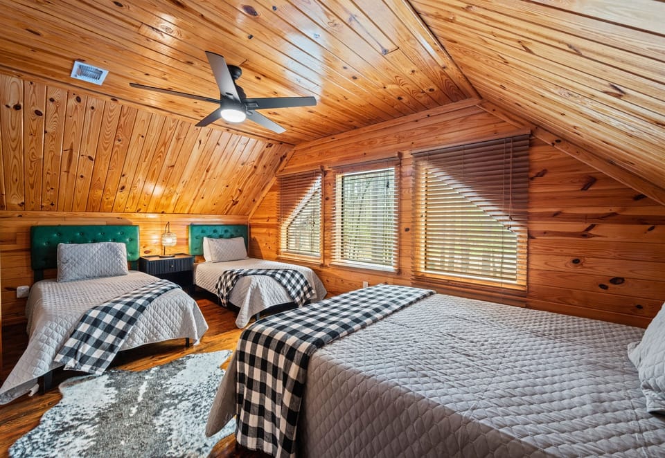 Cozy bedding and a welcoming layout make it a comfortable spot to wind down and get a good night’s rest.
