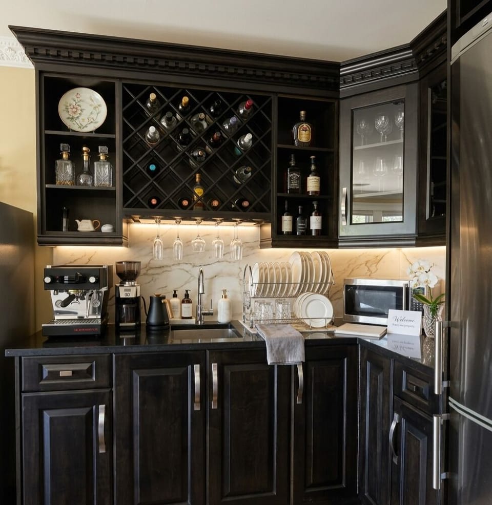 Full-size fridge, microwave, stovetop, cookware/dishes/utensils