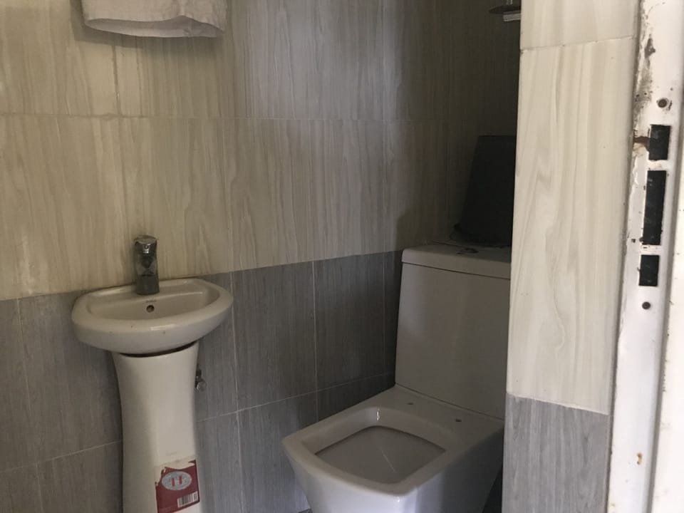 Basic Room, 1 Double Bed, Non Smoking | Bathroom | Combined shower/tub, deep soaking tub, rainfall showerhead